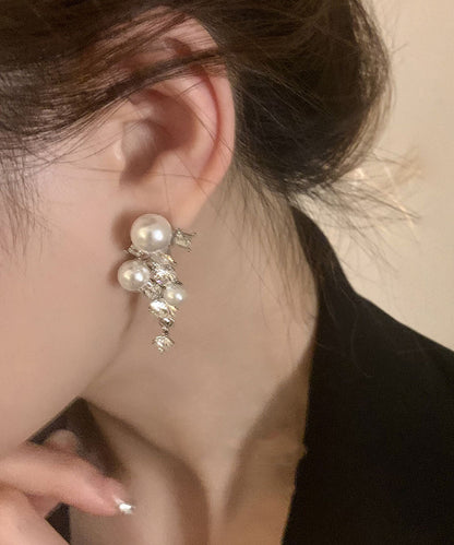 Pendientes únicos de plata de ley con borlas geométricas de circonita y perla