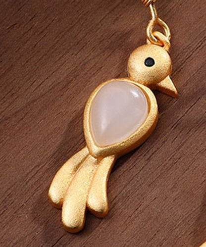 Einzigartige Creolen aus weißer Hetian-Jade mit eingelegtem Königsvogel