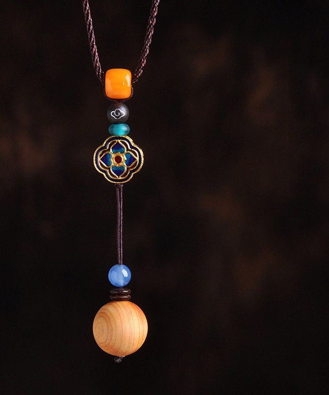 Einzigartige Halskette mit Kleeblatt-Anhänger aus gelbem Cloisonné-Emaille und Bienenwachs-Chalcedon