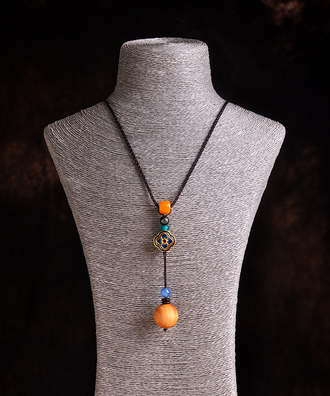 Einzigartige Halskette mit Kleeblatt-Anhänger aus gelbem Cloisonné-Emaille und Bienenwachs-Chalcedon