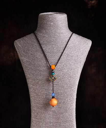 Einzigartige Halskette mit Kleeblatt-Anhänger aus gelbem Cloisonné-Emaille und Bienenwachs-Chalcedon