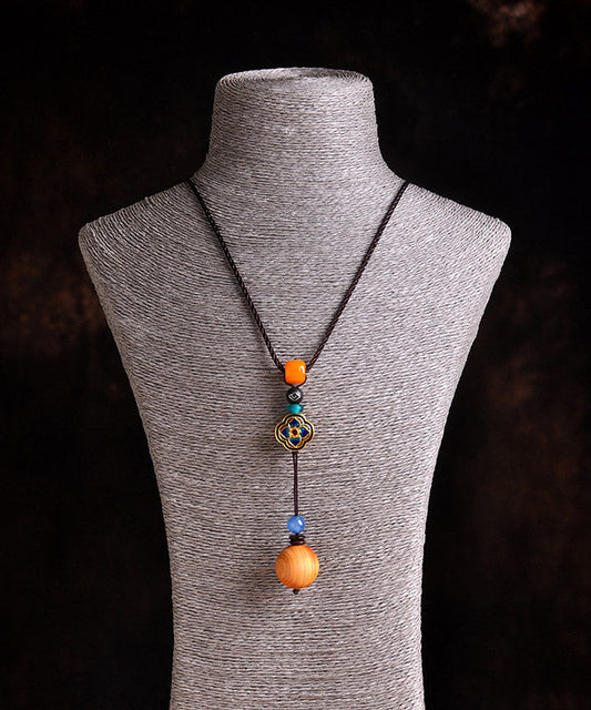 Einzigartige Halskette mit Kleeblatt-Anhänger aus gelbem Cloisonné-Emaille und Bienenwachs-Chalcedon