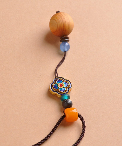 Einzigartige Halskette mit Kleeblatt-Anhänger aus gelbem Cloisonné-Emaille und Bienenwachs-Chalcedon