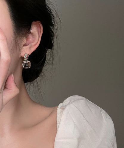 Einzigartige Ohrstecker aus transparenter Legierung mit quadratischen Kristallen