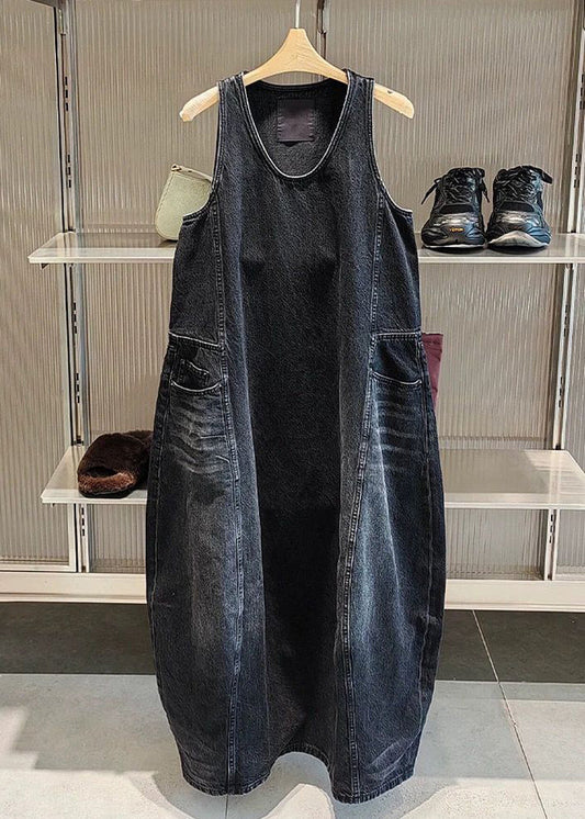 Schwarzes Vintage-Kleid mit Taschen im Originaldesign, ärmellos, lang und lang, mit originellem Design.