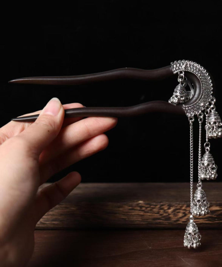 Vintage Haarnadel mit schwarzer Holzquaste und Glockenmotiv