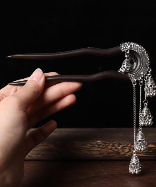 Vintage Haarnadel mit schwarzer Holzquaste und Glockenmotiv