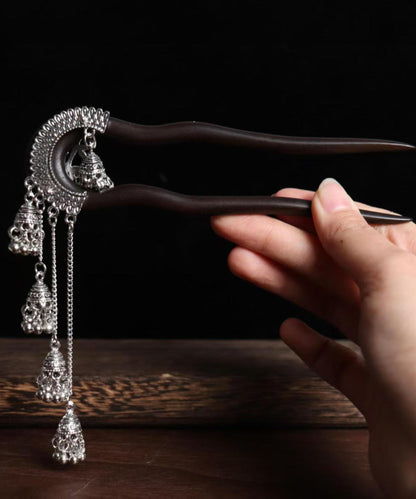 Vintage Haarnadel mit schwarzer Holzquaste und Glockenmotiv