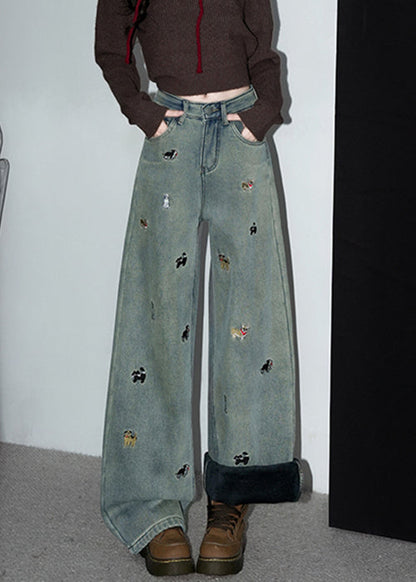 Vintage Denimblaue, bestickte Taschen, warme Fleecehose