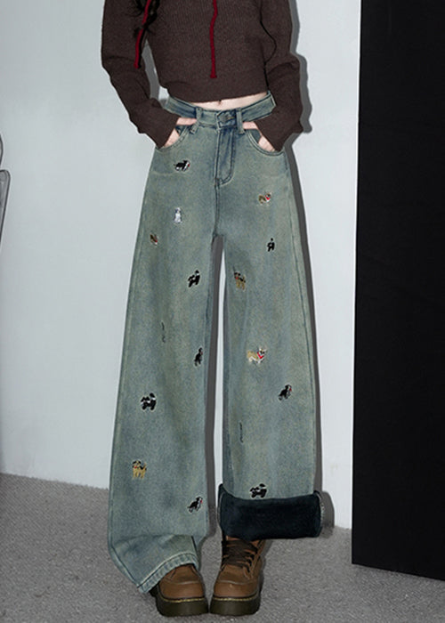 Vintage Denimblaue, bestickte Taschen, warme Fleecehose