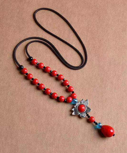 Collar con colgante de cinabrio rojo con patchwork de cristales florales vintage