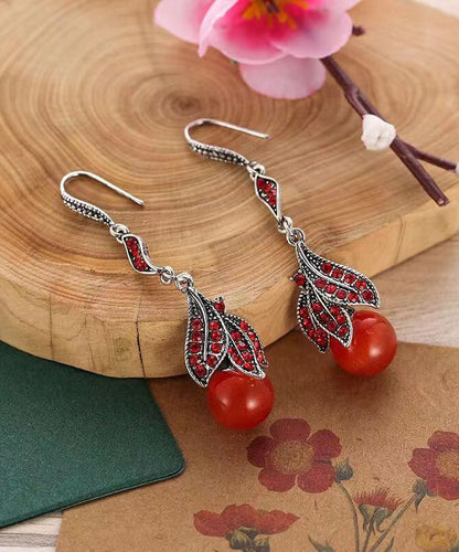 Pendientes vintage con borlas de aleación de cobre verde y circonitas en forma de ojo de gato