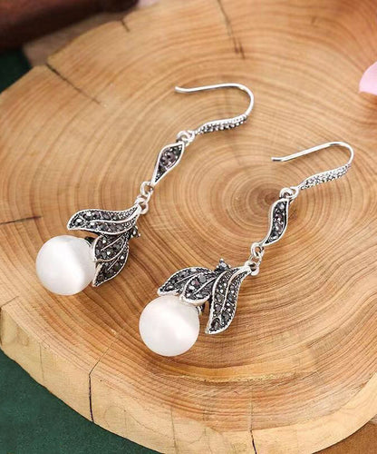 Pendientes vintage con borlas de aleación de cobre verde y circonitas en forma de ojo de gato