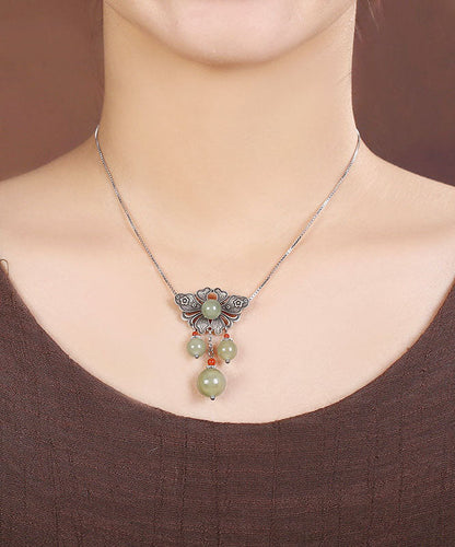 Collar vintage con colgante floral de jade en plata de ley verde