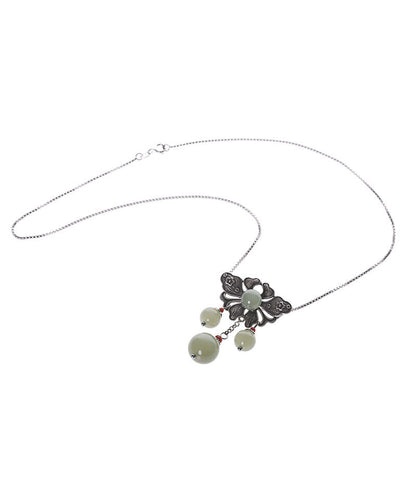 Collar vintage con colgante floral de jade en plata de ley verde
