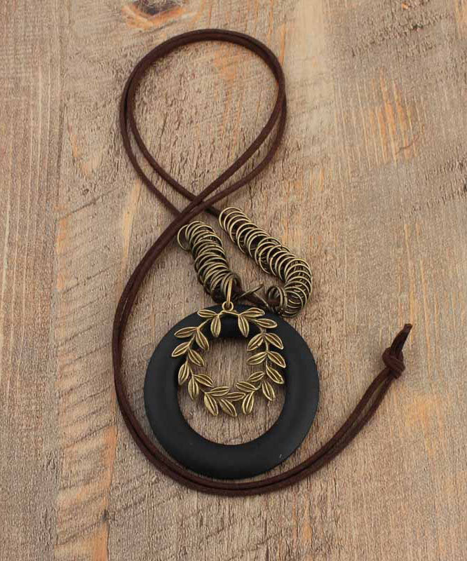 Collar vintage con colgante de madera de olivo y melocotón