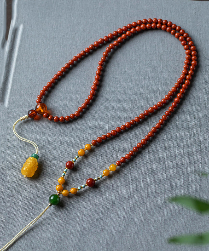Collar vintage con colgante de cera de abejas y ágata roja tejida a mano