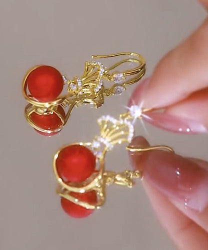 Pendientes colgantes vintage de plata de ley roja con circonitas doradas y perla