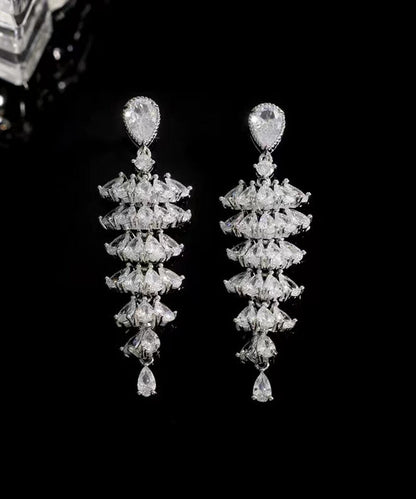 Pendientes estilo pagoda con circonitas bañadas en plata y cobre de seda vintage