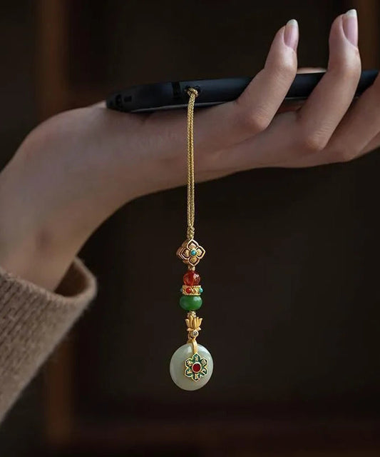 Vintage-Handyketten aus gelbversilbertem, vergoldetem Jade, Türkis, Lotus und vierblättrigem Kleeblatt