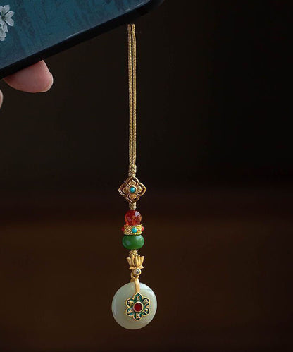 Vintage-Handyketten aus gelbversilbertem, vergoldetem Jade, Türkis, Lotus und vierblättrigem Kleeblatt