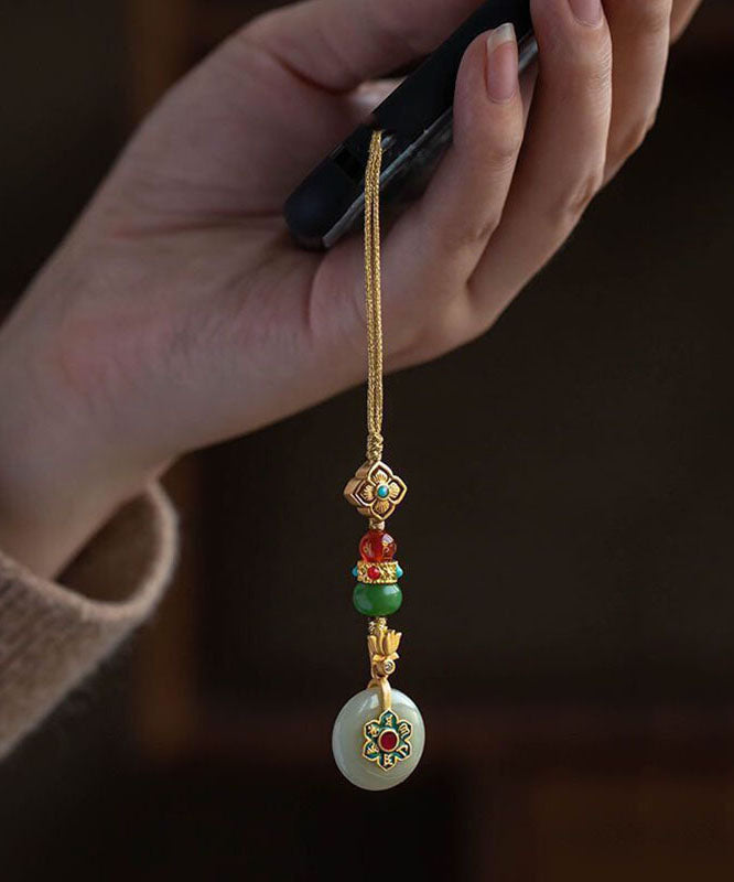 Vintage-Handyketten aus gelbversilbertem, vergoldetem Jade, Türkis, Lotus und vierblättrigem Kleeblatt