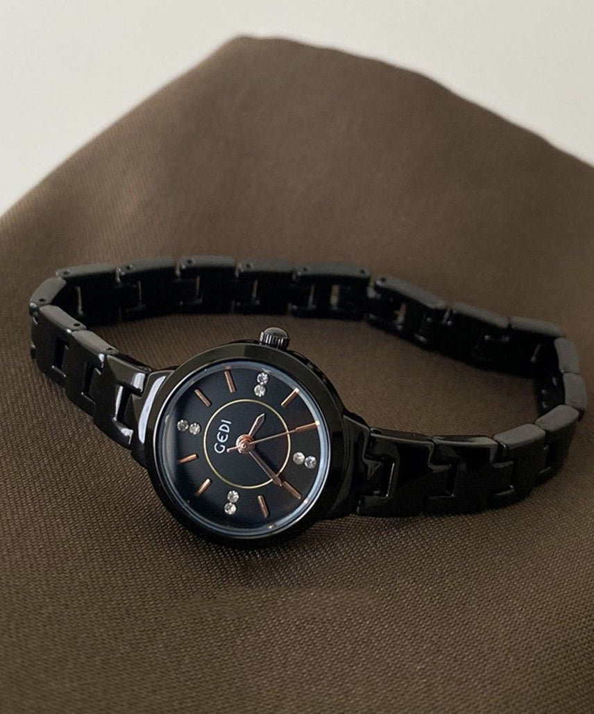 Vogue Schwarze Edelstahllegierung, verstärktes Glas, wasserdichte Uhren