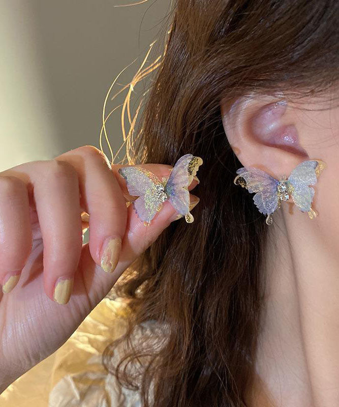 Pendientes de mariposa de tul con circonita acrílica de cobre azul Vogue