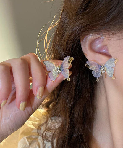 Pendientes de mariposa de tul con circonita acrílica de cobre azul Vogue