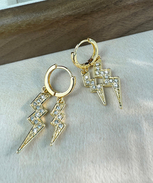 Pendientes de aro con relámpagos de circonitas doradas y cobre de Vogue