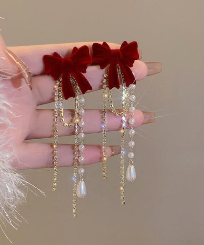 Pendientes Vogue Mulberry de aleación de circonita, perla, terciopelo, lazo y borla