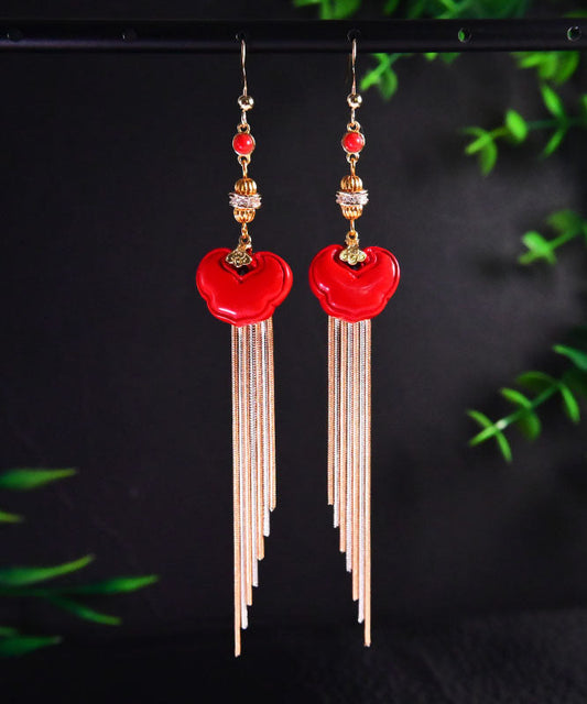 Pendientes colgantes con borlas de ruyi y cinabrio en oro rojo de 14 quilates de Vogue