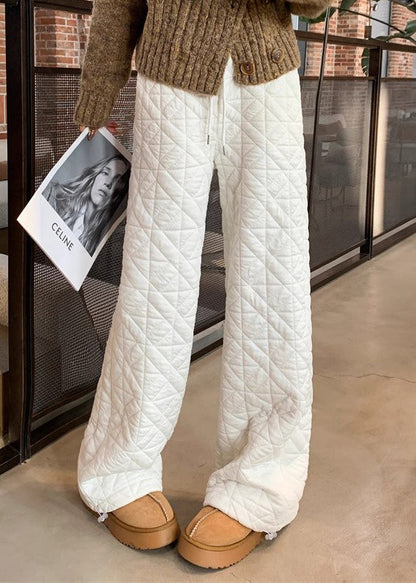 Pantalones de polar cálidos con cintura elástica y bolsillos blancos a cuadros