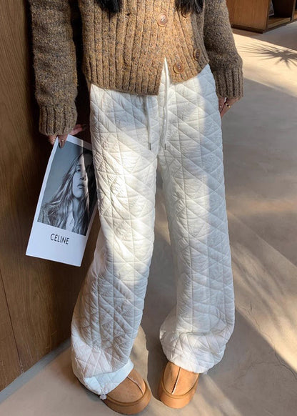 Pantalones de polar cálidos con cintura elástica y bolsillos blancos a cuadros