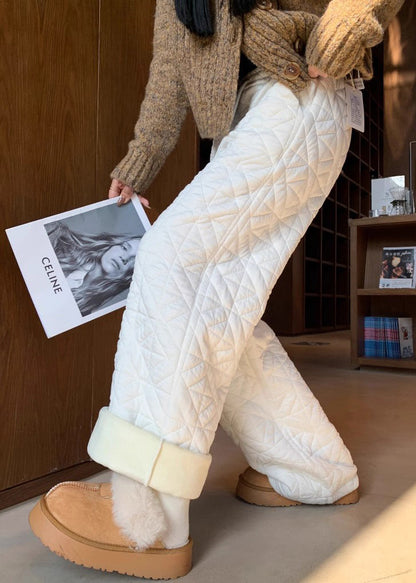 Pantalones de polar cálidos con cintura elástica y bolsillos blancos a cuadros