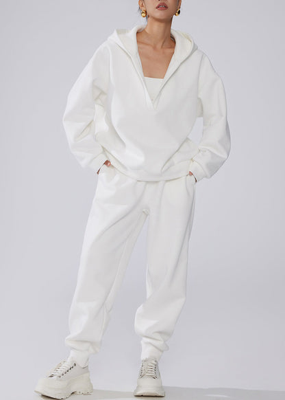 Conjunto de dos piezas de forro polar cálido con cintura elástica y bolsillos blancos y capucha para invierno.