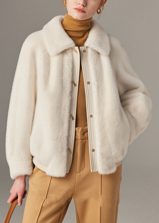 Abrigo de pelo de visón con patchwork de piel sintética y bolsillos blancos, cuello Peter Pan