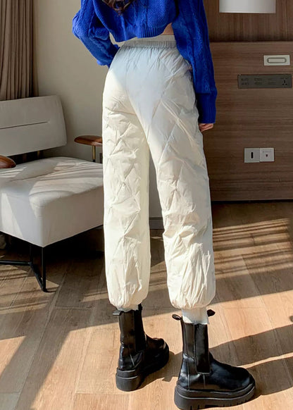 Weiße, einfarbige, mit feiner Baumwolle gefütterte Cropped-Hose mit Taschen und elastischem Bund