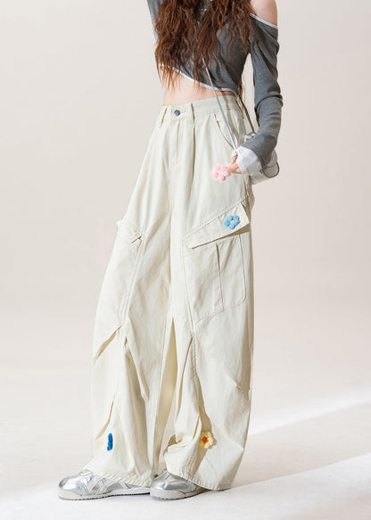 Pantalones vaqueros arrugados con estampado floral y bolsillos color albaricoque para mujer, primavera