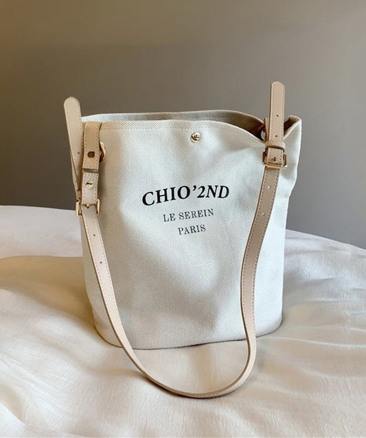 Bolso de hombro de lona de gran capacidad con letras beige para mujer
