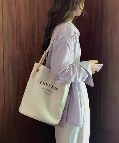 Bolso de hombro de lona de gran capacidad con letras beige para mujer