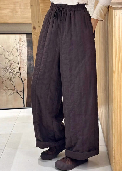 Beige Damenhose mit Taschen, elastischem Bund und feiner Baumwollfüllung für den Winter