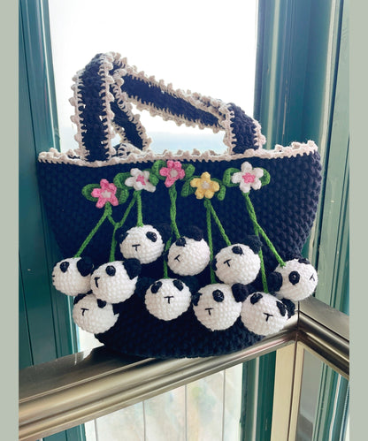 Schwarze, handgefertigte Strick-Handtasche mit Blumenmuster für Damen