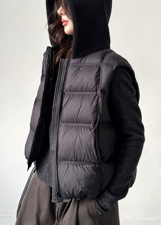 Chaleco de plumón de pato sin mangas con bolsillos y cremallera en color negro para mujer