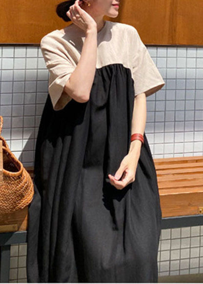 Damen Schwarzes seitlich offenes Patchworkkleid mit kurzen Ärmeln