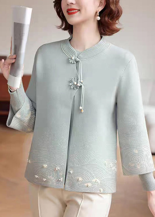 Abrigo de punto de algodón con cuello alto azul para mujer, manga tres cuartos