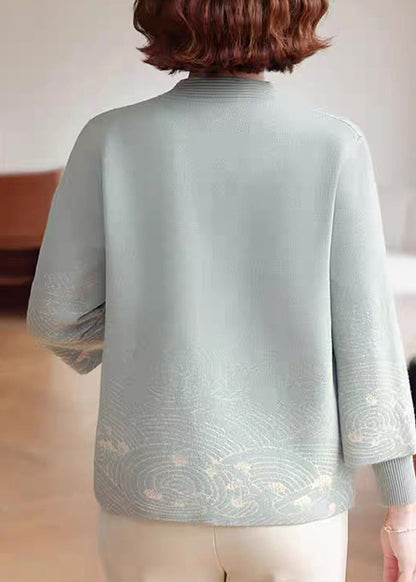 Abrigo de punto de algodón con cuello alto azul para mujer, manga tres cuartos