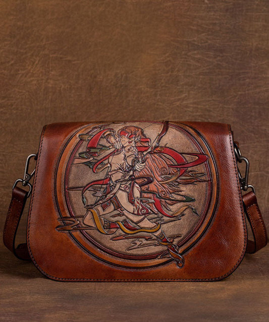 Damen Handtasche mit Sternbild-Motiven aus Kalbsleder in Braun