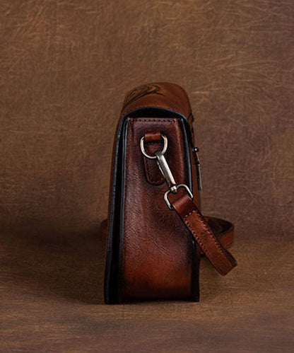 Damen Handtasche mit Sternbild-Motiven aus Kalbsleder in Braun