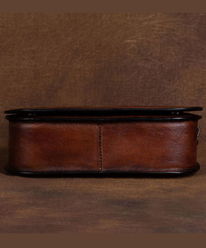 Damen Handtasche mit Sternbild-Motiven aus Kalbsleder in Braun